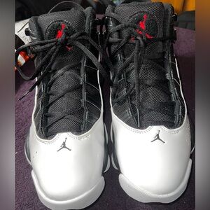 Jordan Black and White Sneakers with Red Detail